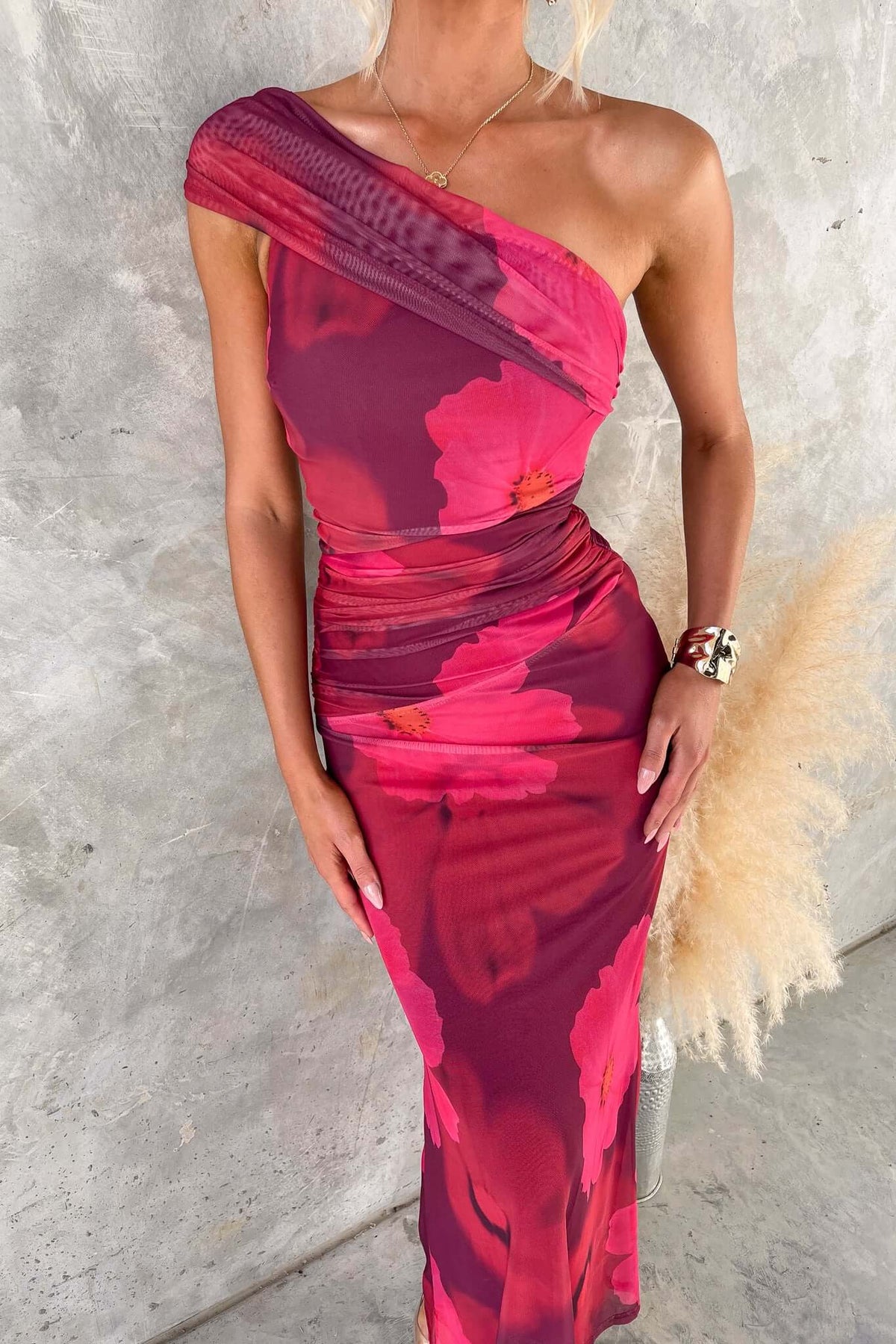 Korren Maxi Dress featuring a one-shoulder neckline and floral mesh material, perfect for a stylish evening out.