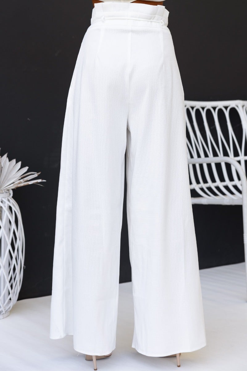 Long Shot Pants featuring a paperbag waist, removable tie, and wide-leg design in elegant white fabric.