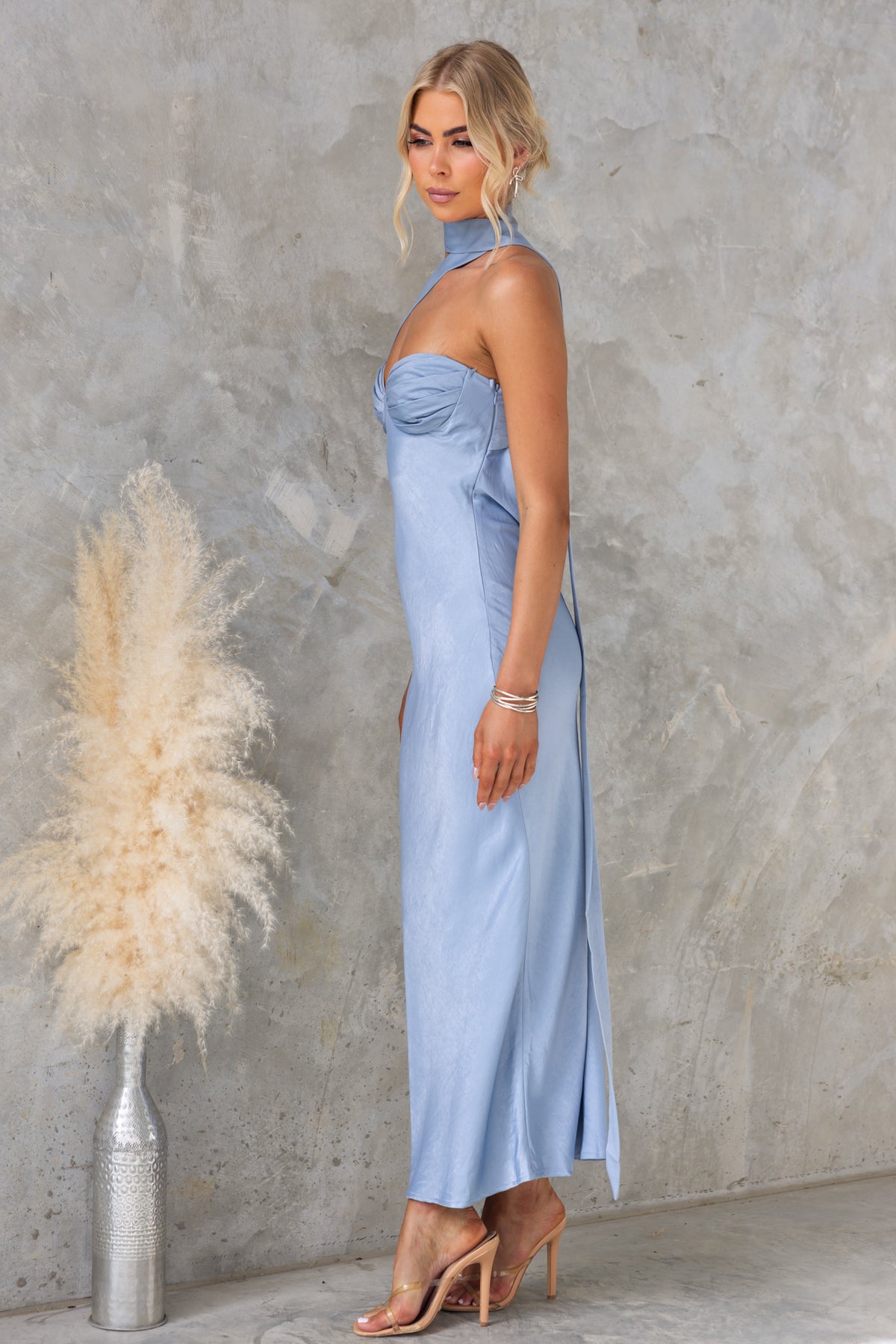 Lydie Maxi Dress by Amaroso Bridal, showcasing a strapless design with a slight sheen and side zip detail.