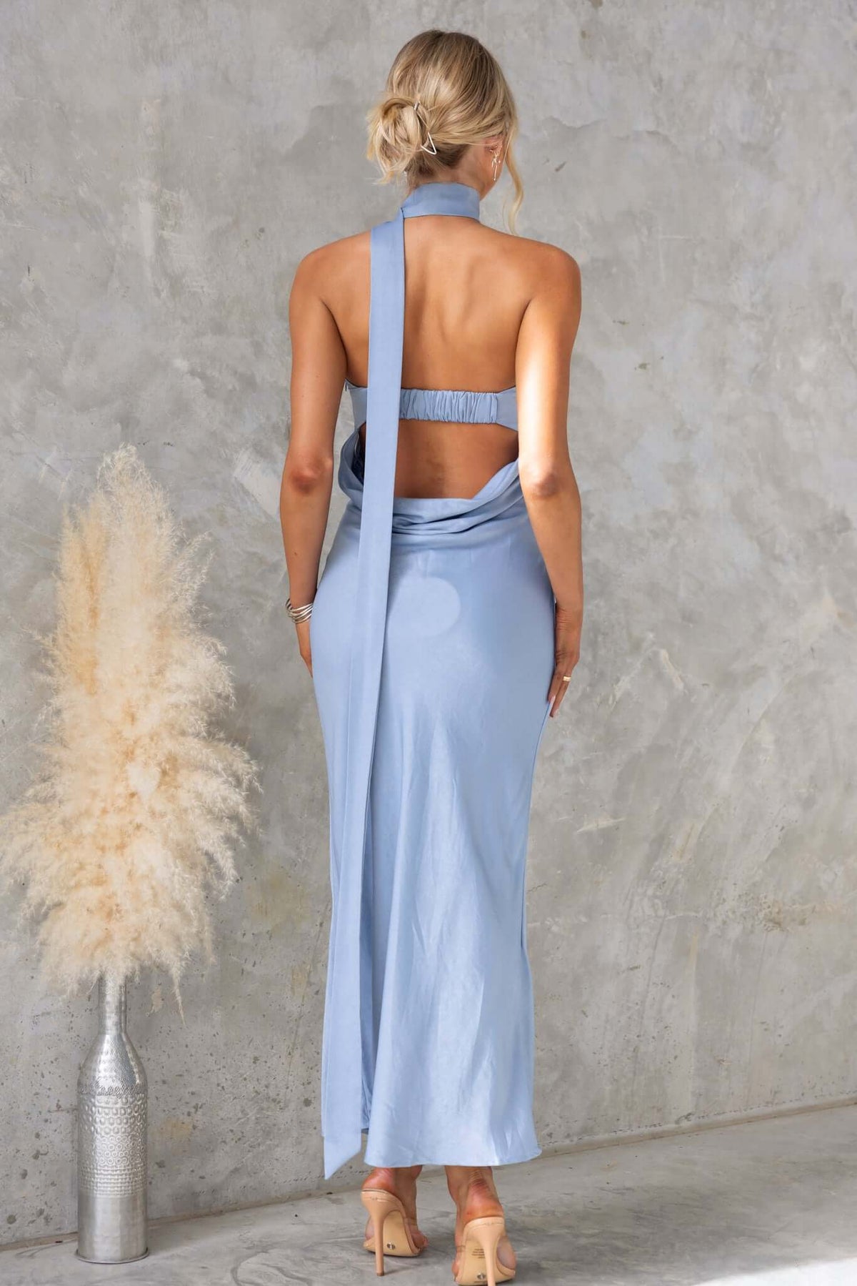 Lydie Maxi Dress in light blue, strapless with an attached tie and elegant back design, perfect for formal occasions.