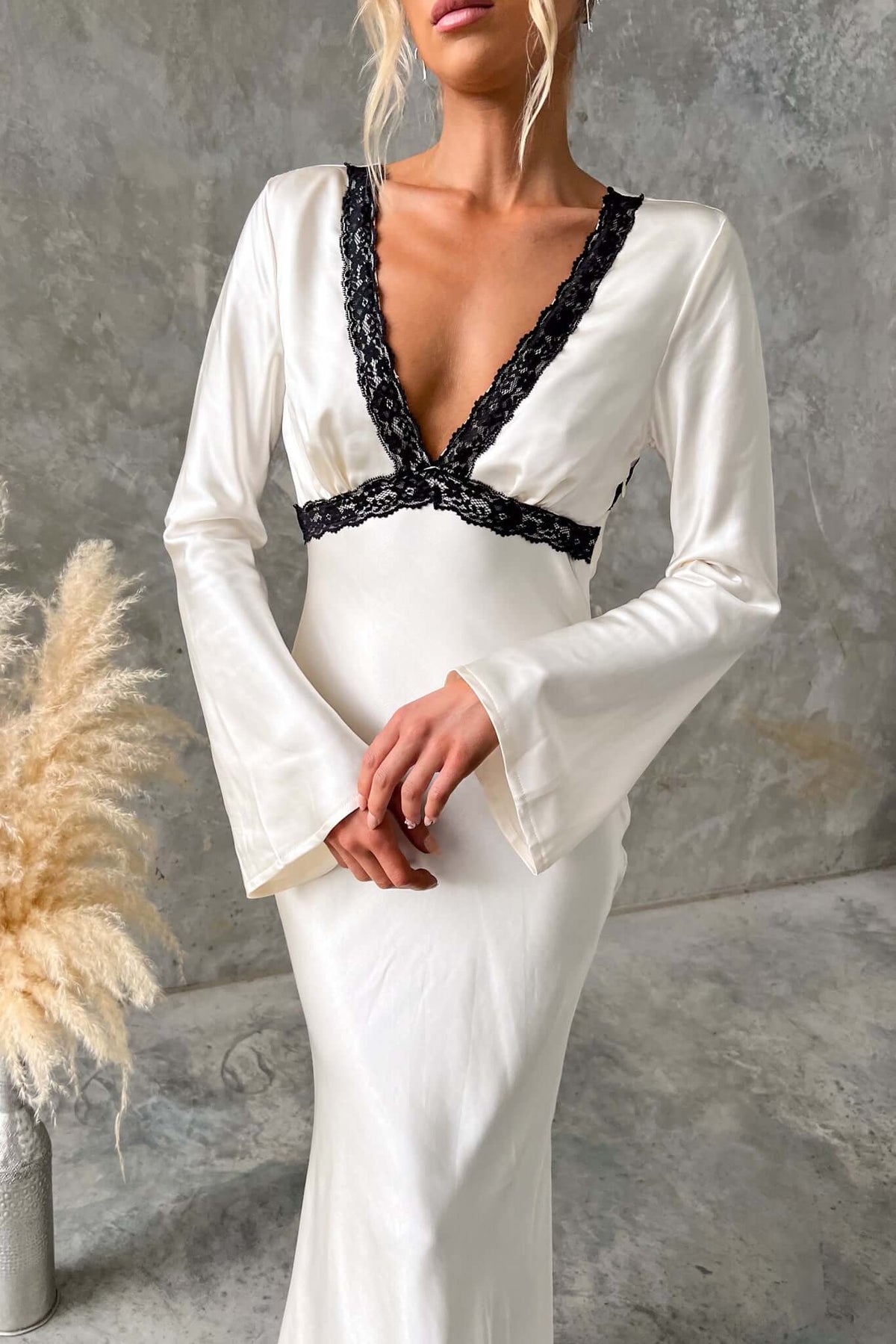 Elegant Nicholie Maxi Dress with lace detail and flared sleeves, perfect for bridal occasions.