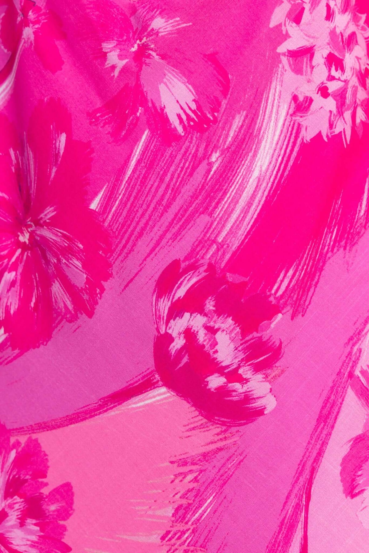 Close-up of the flower pattern on the Calm Soul Maxi Dress in vibrant pink hues.