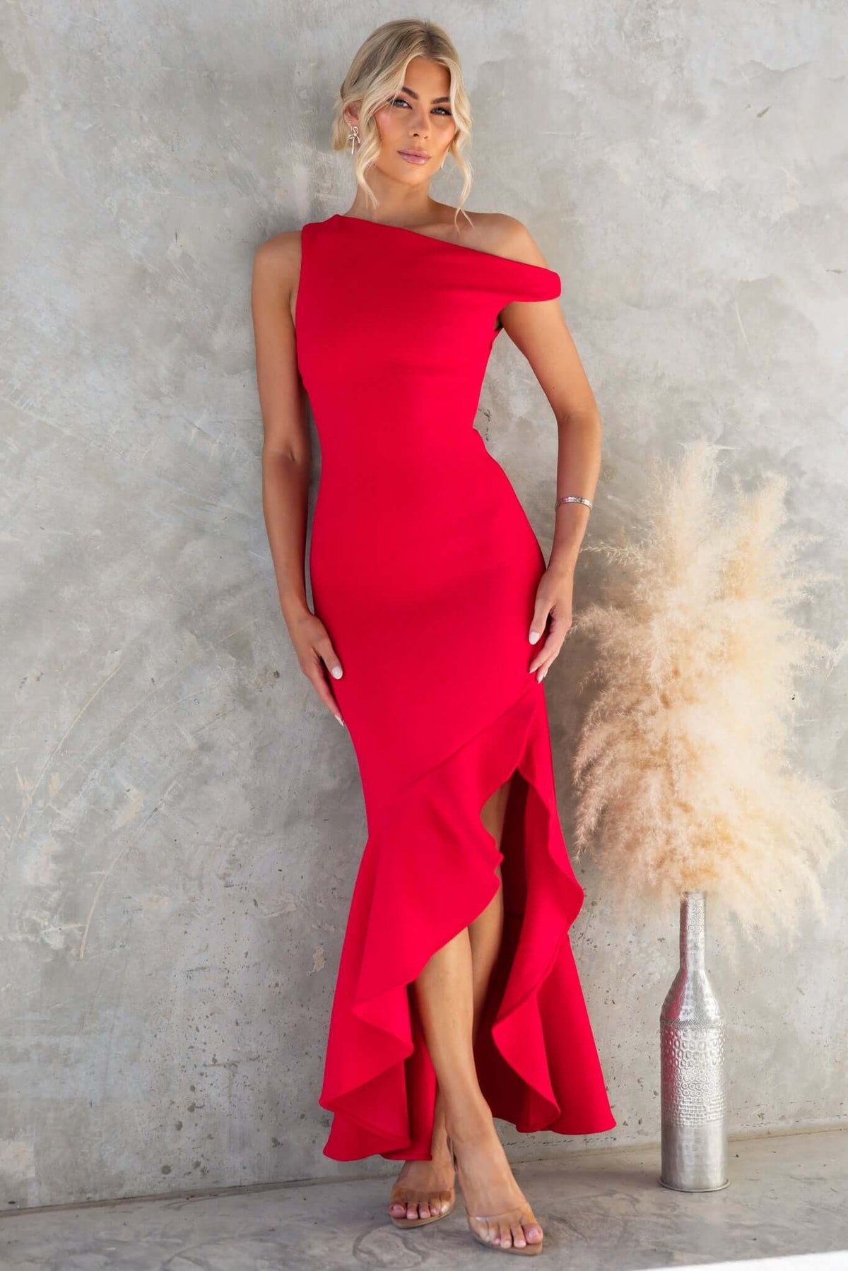 Raleigh Maxi Dress by Amaroso Bridal in red, featuring asymmetric neckline and hemline, perfect for special occasions.