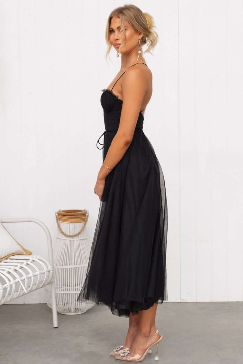 Florence Midi Dress in black, featuring adjustable straps, tulle material, and a flowy silhouette.