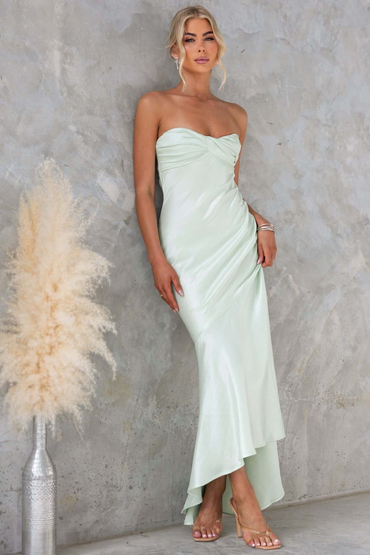 Sancia Maxi Dress in light green, strapless design with slight sheen, perfect for formal occasions.