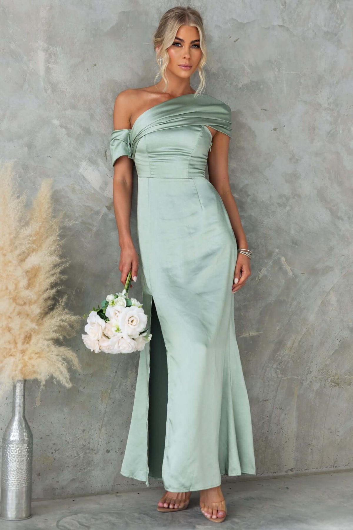 Sonnet Maxi Dress by Amaroso Bridal, satin, asymmetric neckline, split side, elegant green, perfect for weddings.