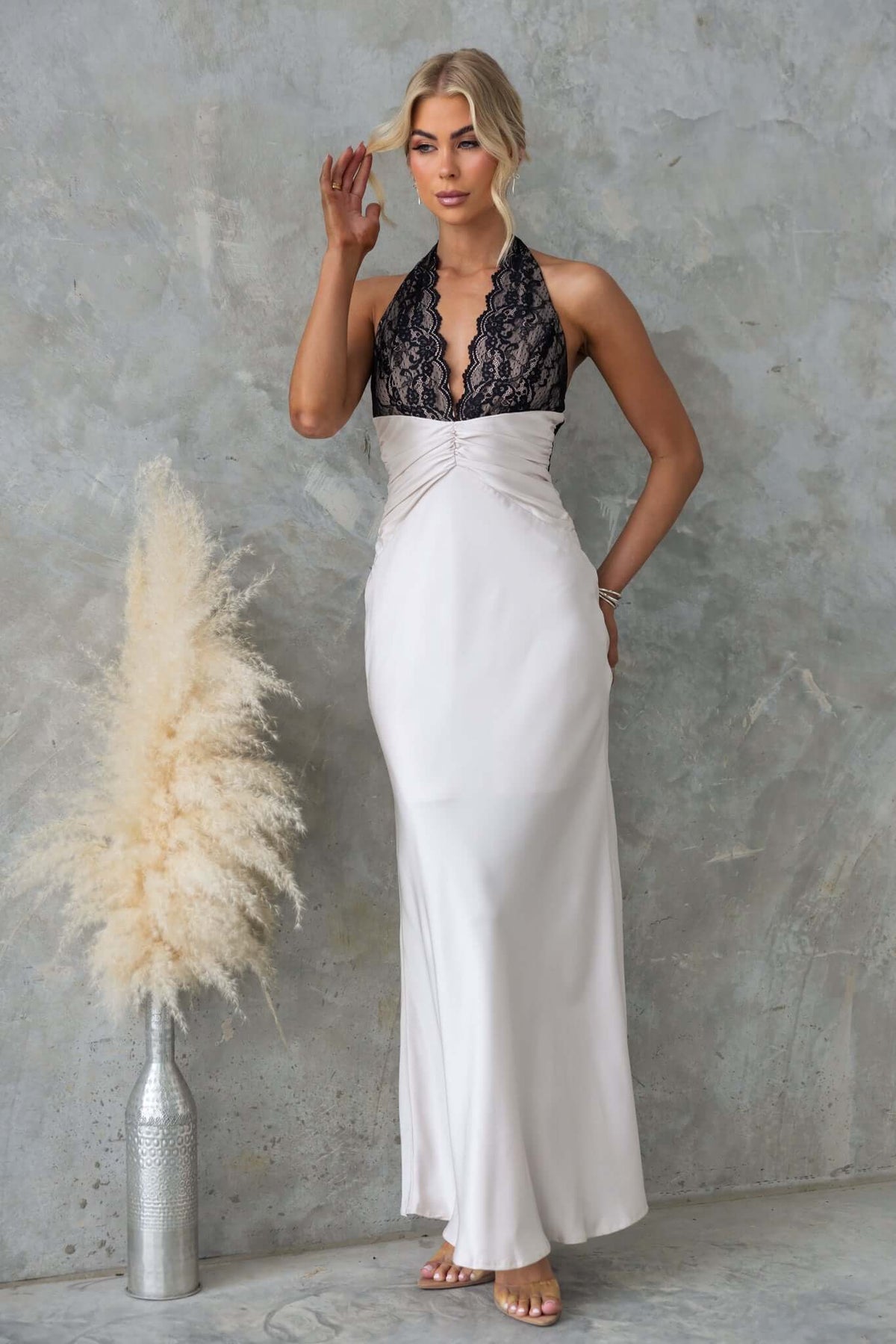 Elegant Sonrisa Maxi Dress featuring lace bust, satin feel, and tie neckline, perfect for formal occasions.