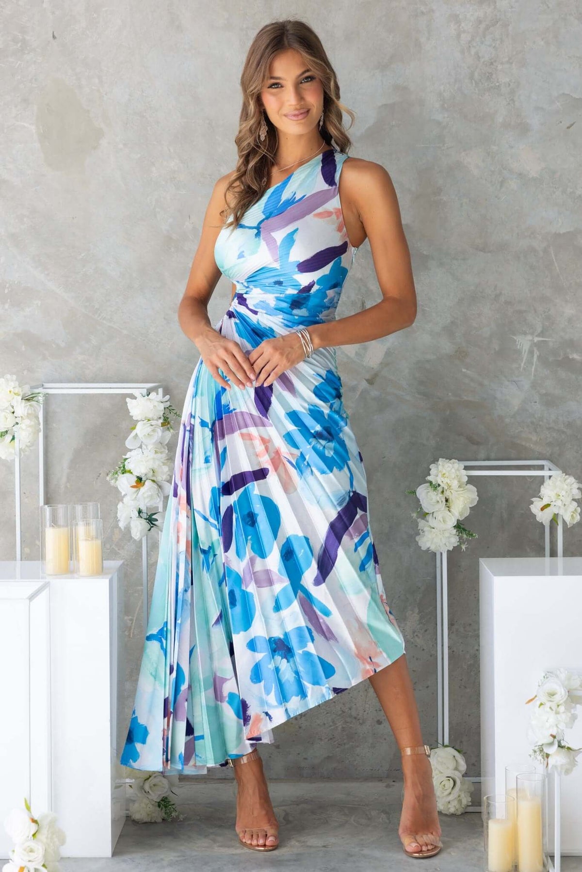 Olympia Maxi Dress featuring a one-shoulder neckline and colorful floral print, perfect for summer occasions.
