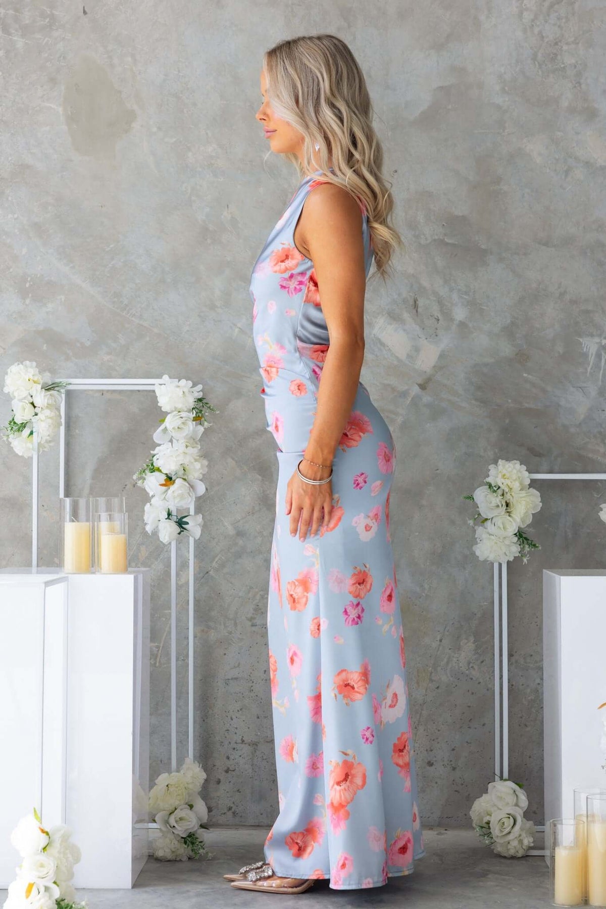 Side view of Jadeite Maxi Dress featuring floral print, one-shoulder neckline, and satin finish.