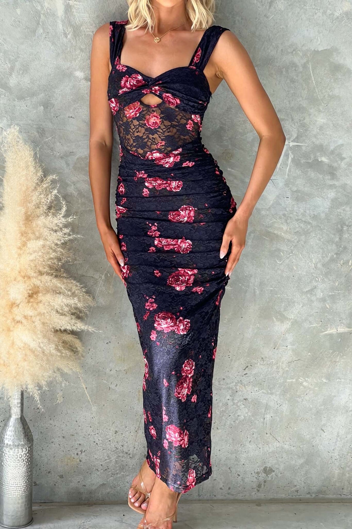 Navy floral Xavina maxi dress with twist detail and cut-out at bust, featuring ruching and an invisible zip.