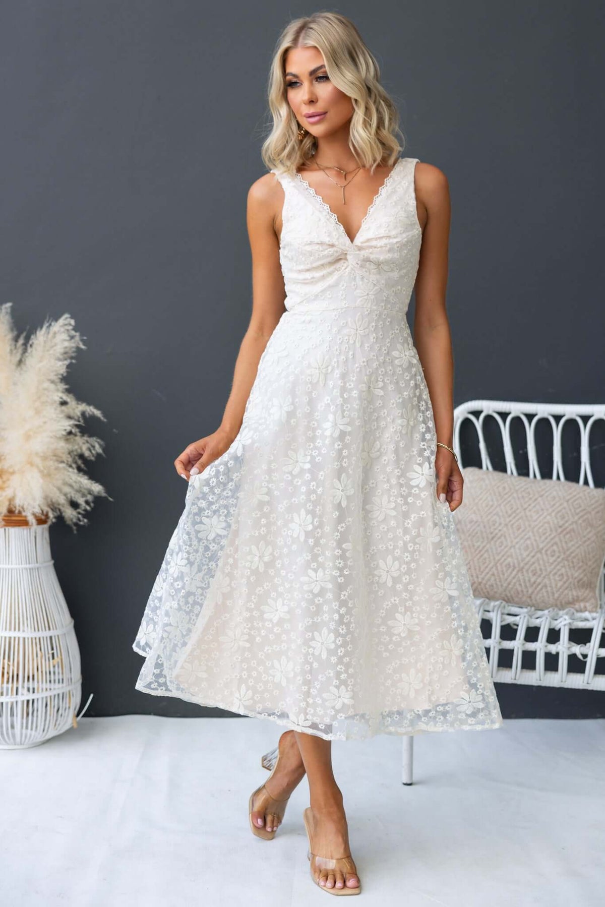 Yakima Midi Dress: Elegant floral midi dress with twist at bust and invisible back zip, perfect for any occasion.