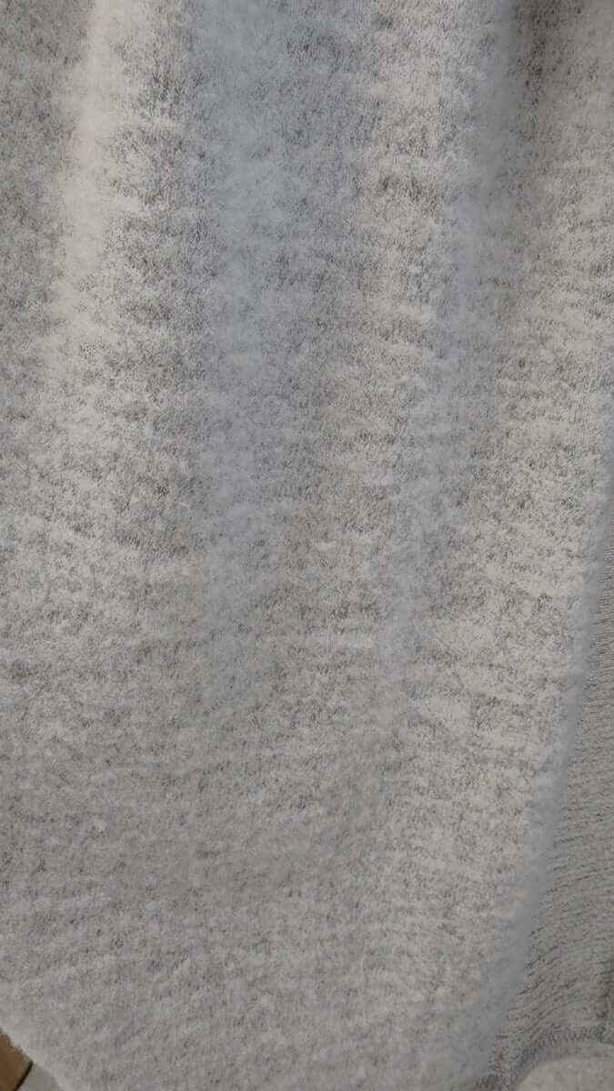 Soft, light grey fabric of the Right Time Cardigan showcasing its comfortable texture and stretch.