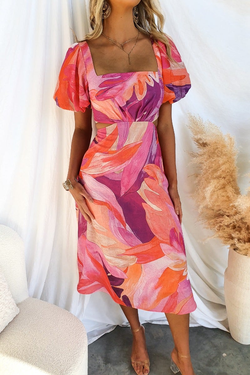 Ayla Midi Dress in vibrant multi-colors featuring a square neckline and elastic cuffed sleeves.