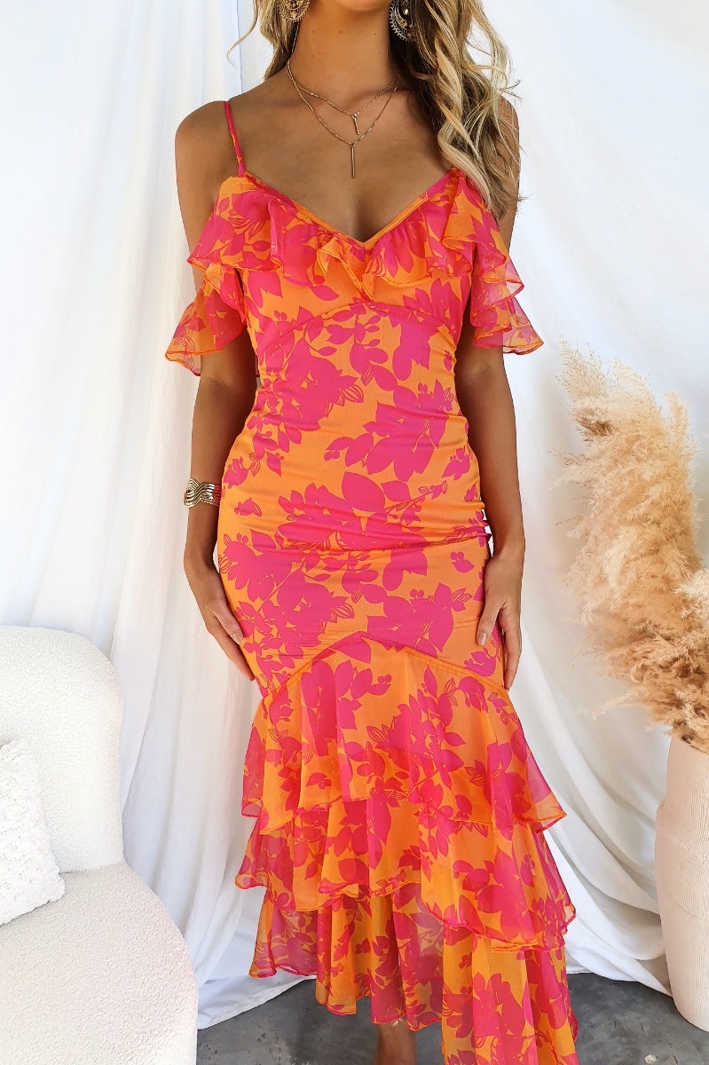 Floral print Costa Rica maxi dress with adjustable straps and ruffle sleeves, featuring a multi-tier skirt.