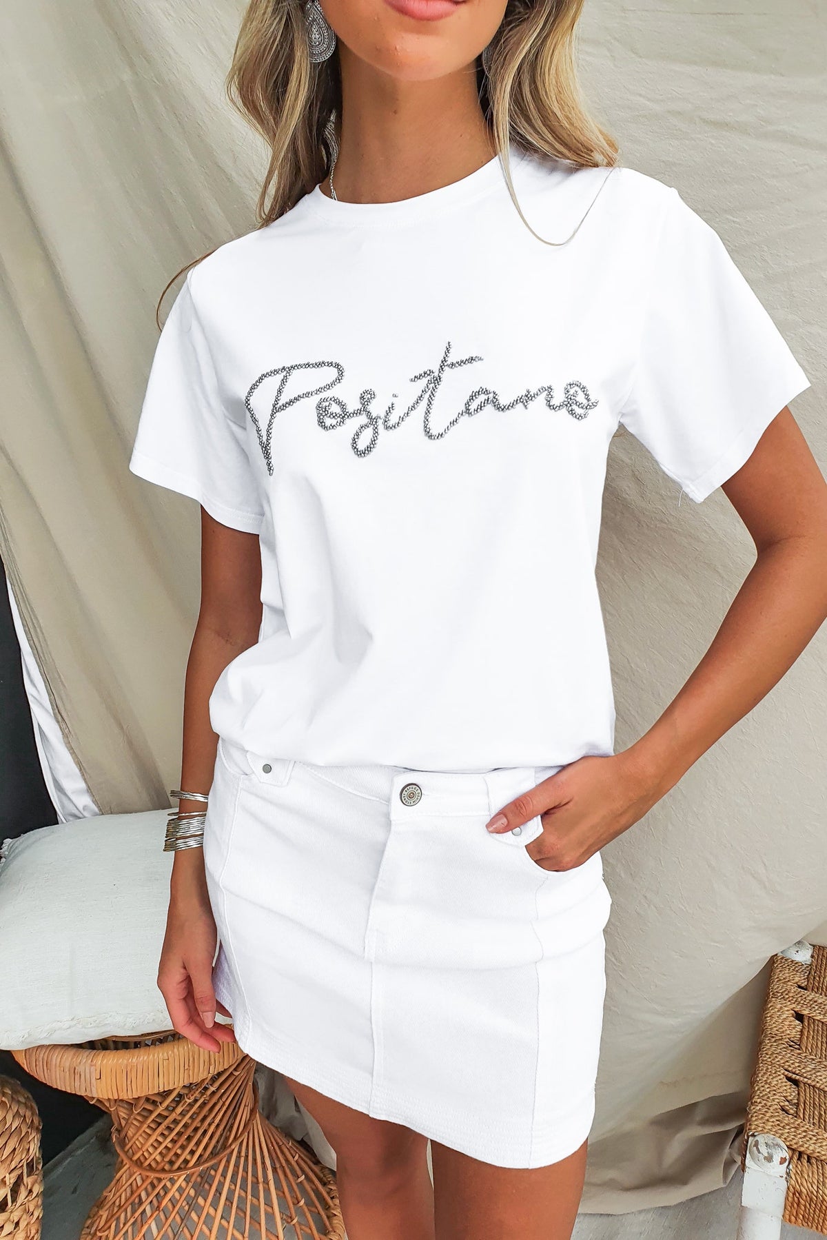Model wearing the Landon Tee with 'Positano' print, featuring a round neckline and soft cotton fabric.