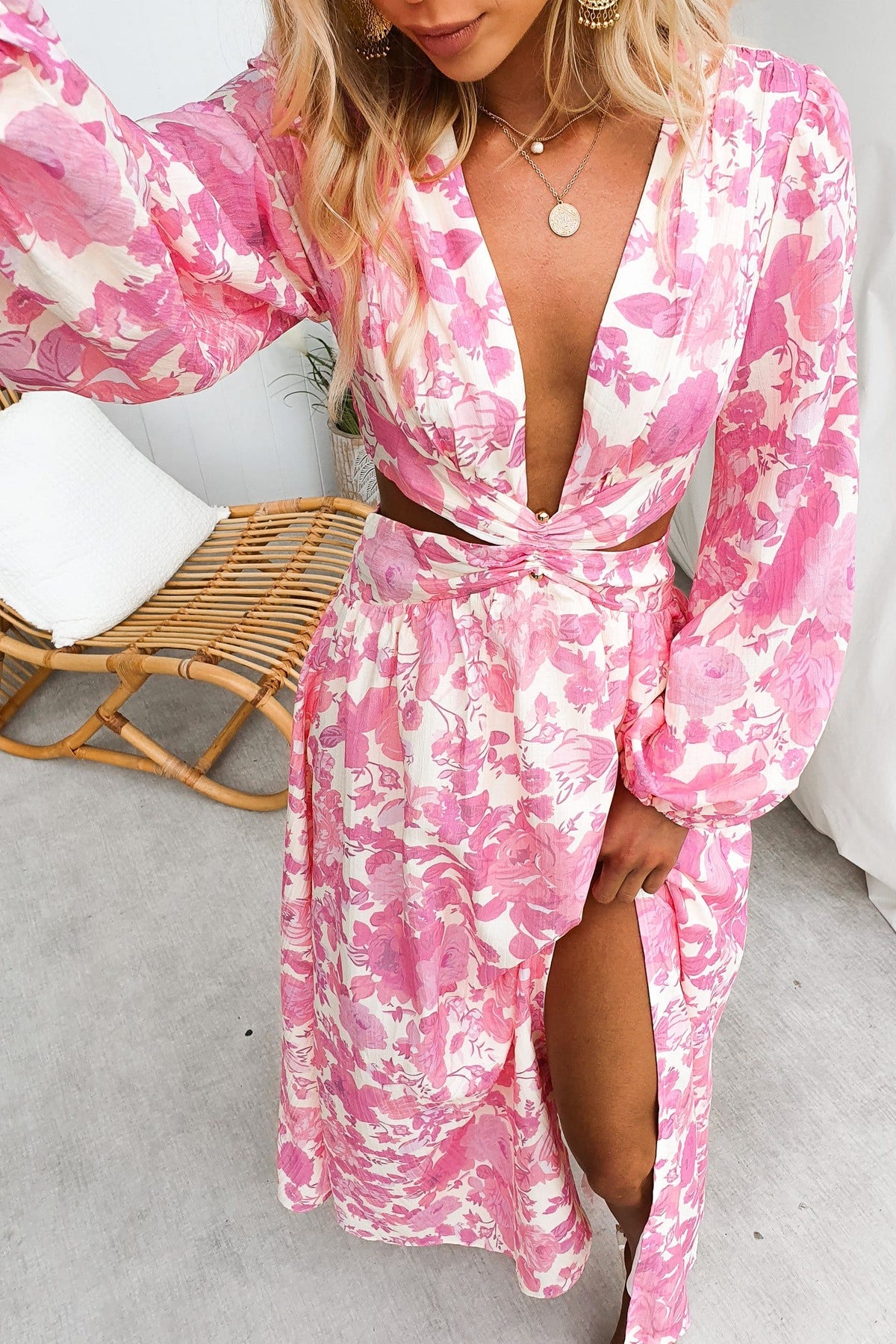 Just Joy Maxi Dress with plunge neckline, cut-out waist, and floral print in pink, perfect for a chic summer look.
