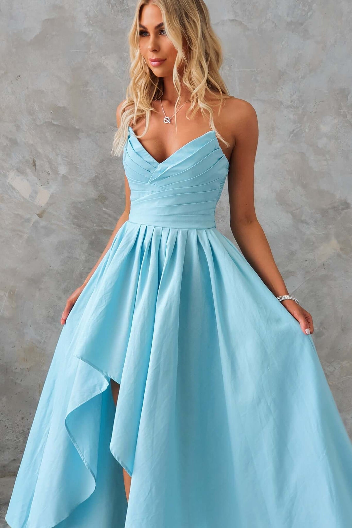 Kiss And Tell Maxi Dress in light blue, featuring a strapless design and asymmetric hem, perfect for elegant occasions.
