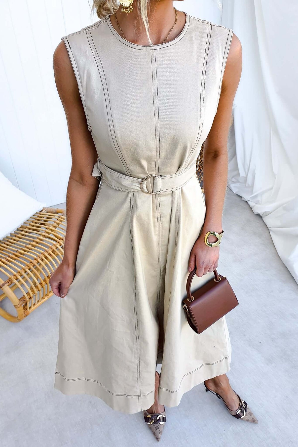 Ravil Denim Midi Dress featuring a sleeveless design, removable belt, and chic styling for a fashionable look.