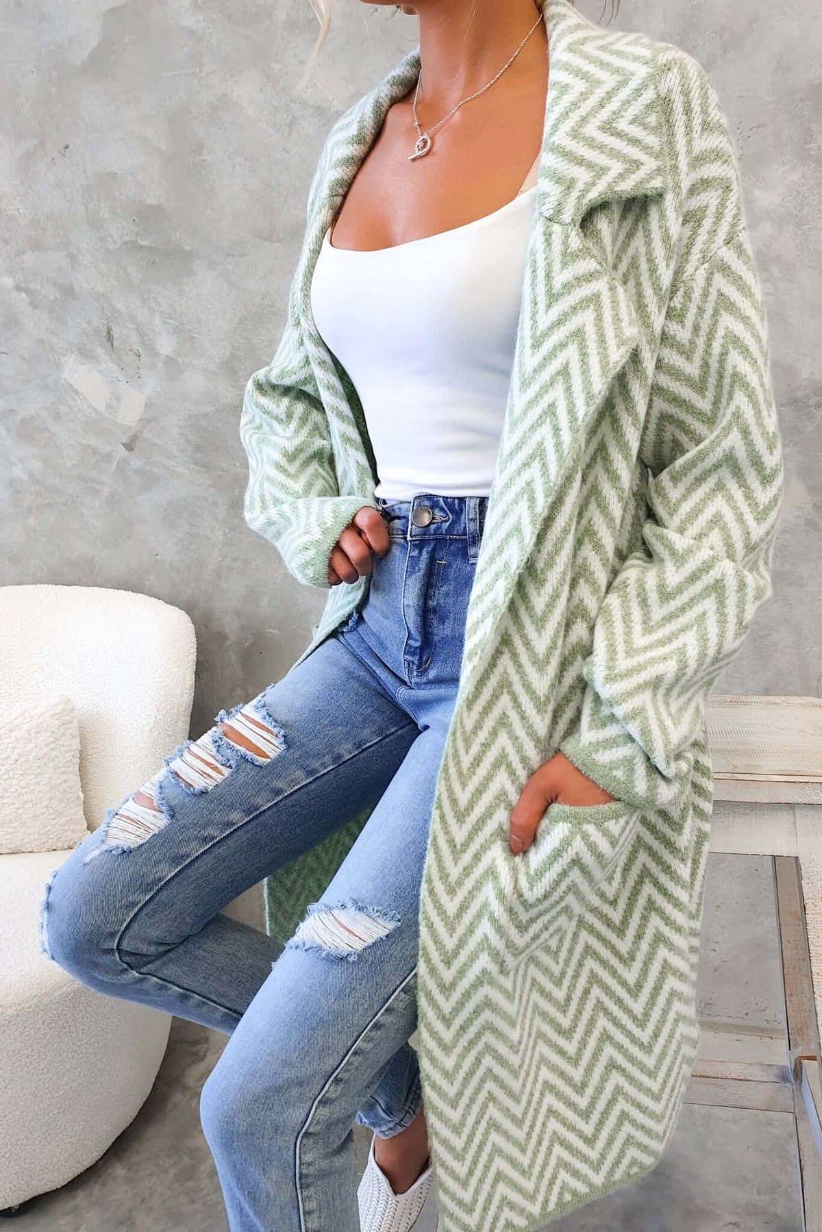 Adabella Cardigan in light green with herringbone pattern, styled with a white tank and distressed jeans.