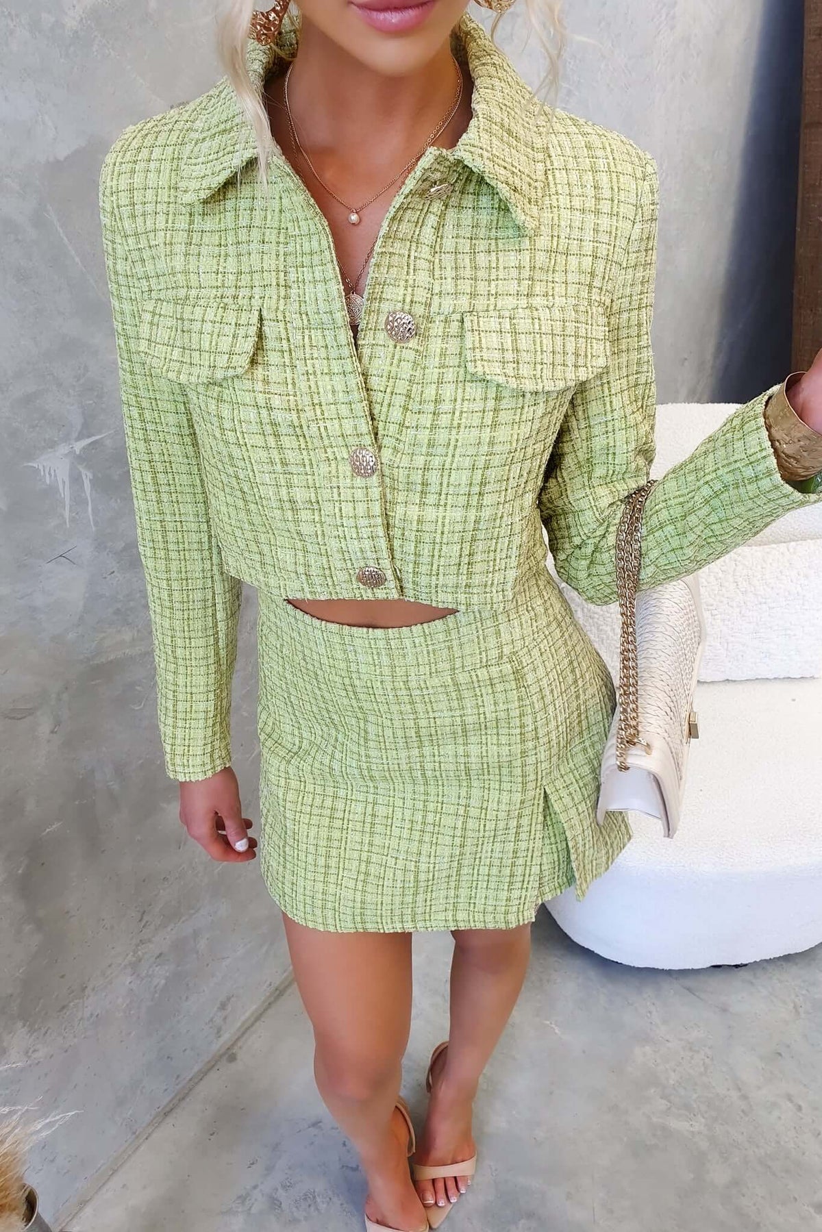 Sophia Coat: stylish green tweed coat with collar, faux pockets, button-up front, and cropped fit worn by a model.