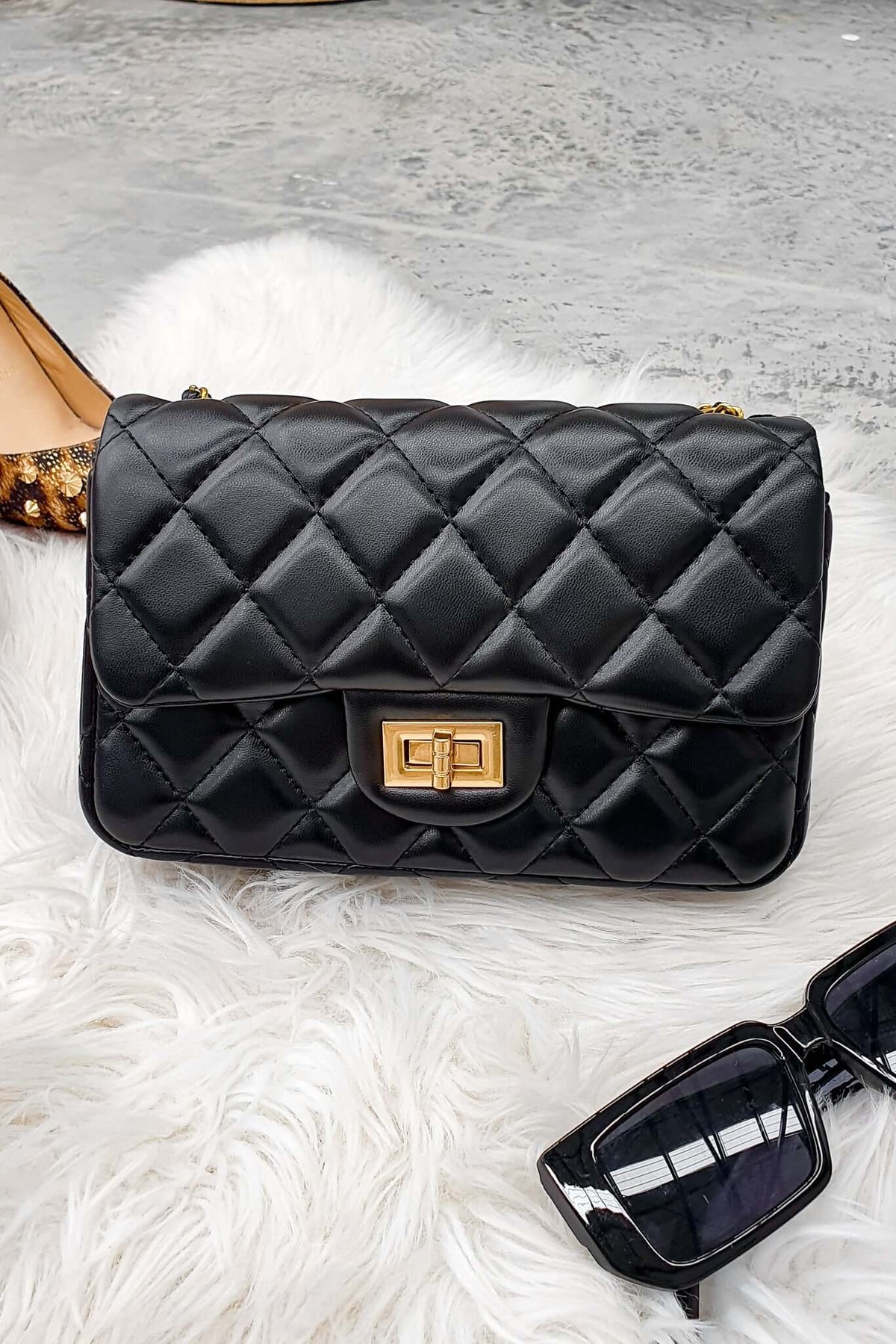 Chic Chelsea Bag with quilted finish, gold hardware, and stylish design, perfect for nights out.