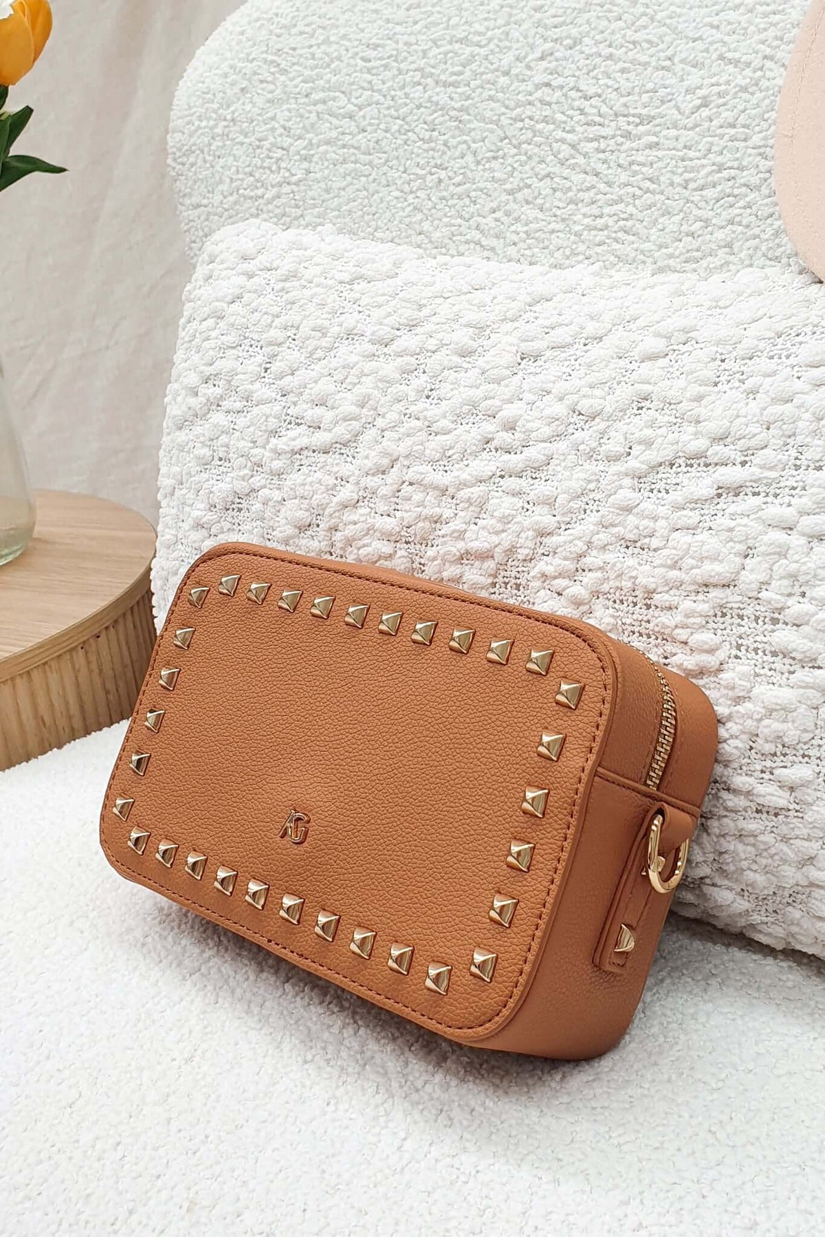 Veronica Crossbody Bag in tan with metallic studs, stylish and compact for essentials, ideal for a night out.