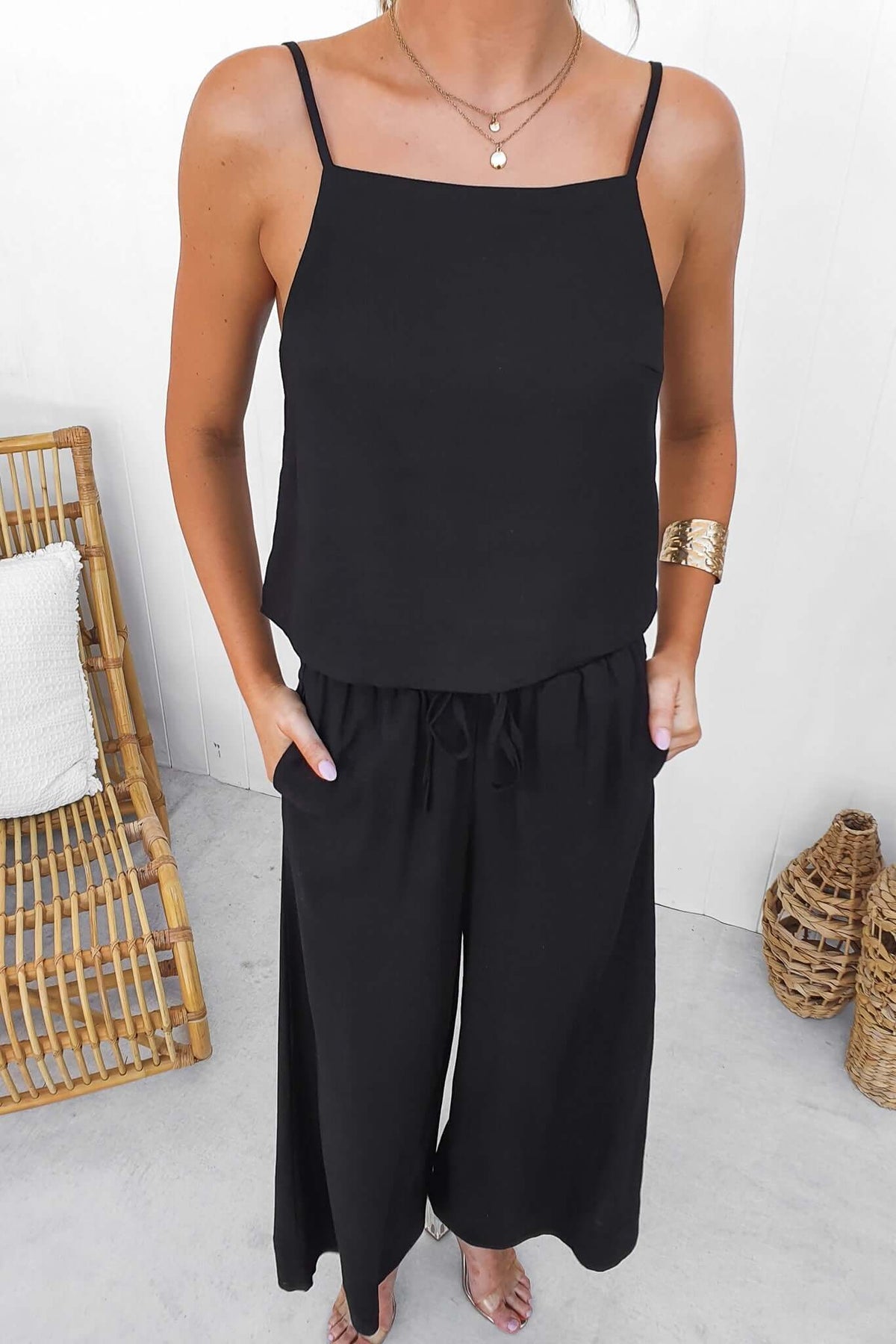 Black Frances Top with adjustable tie straps, linen feel, and lined design, perfect for stylish summer outfits.