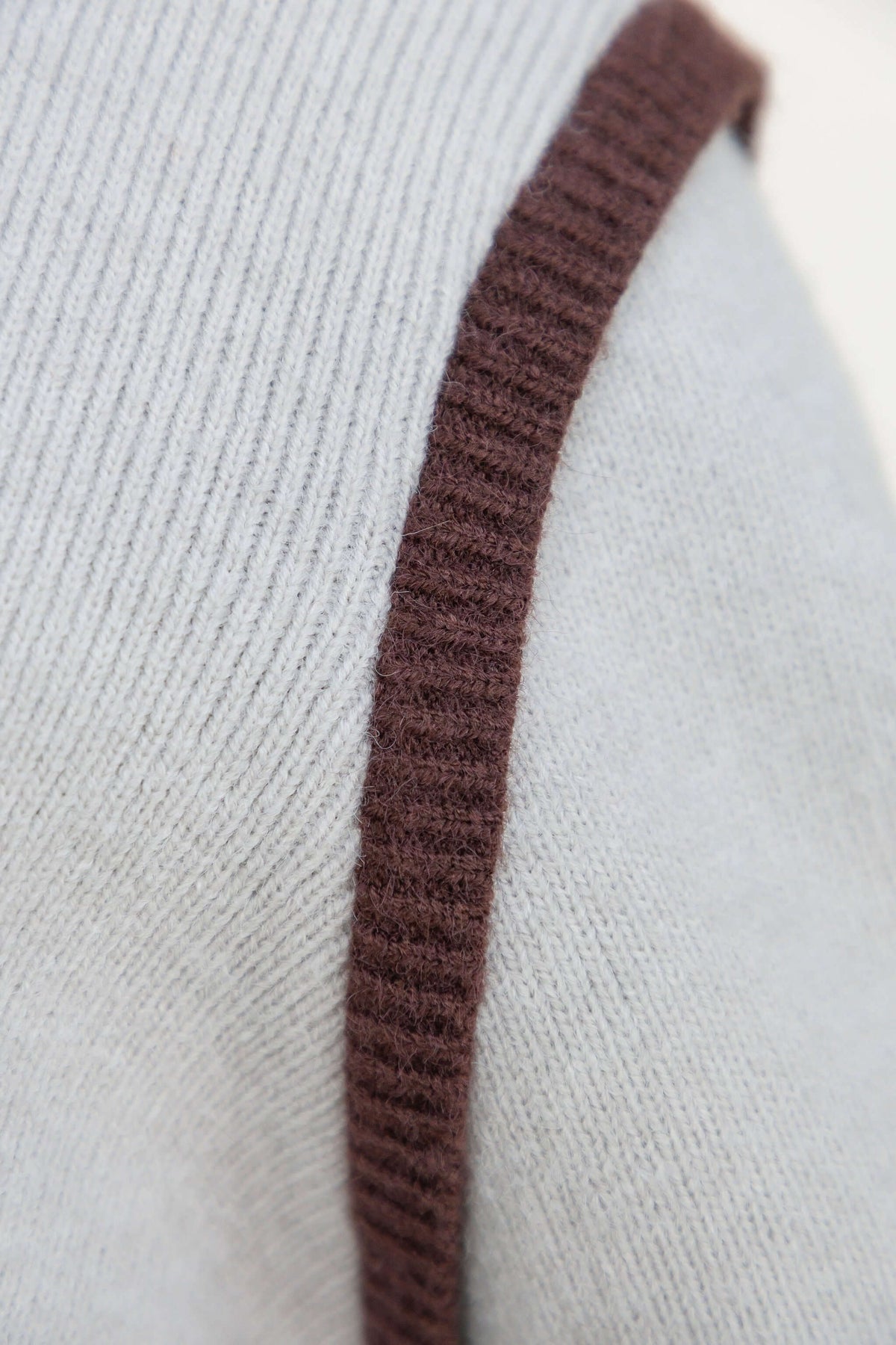 Close-up detail of the Nights Out Jumper showcasing the knit texture and contrasting trim.