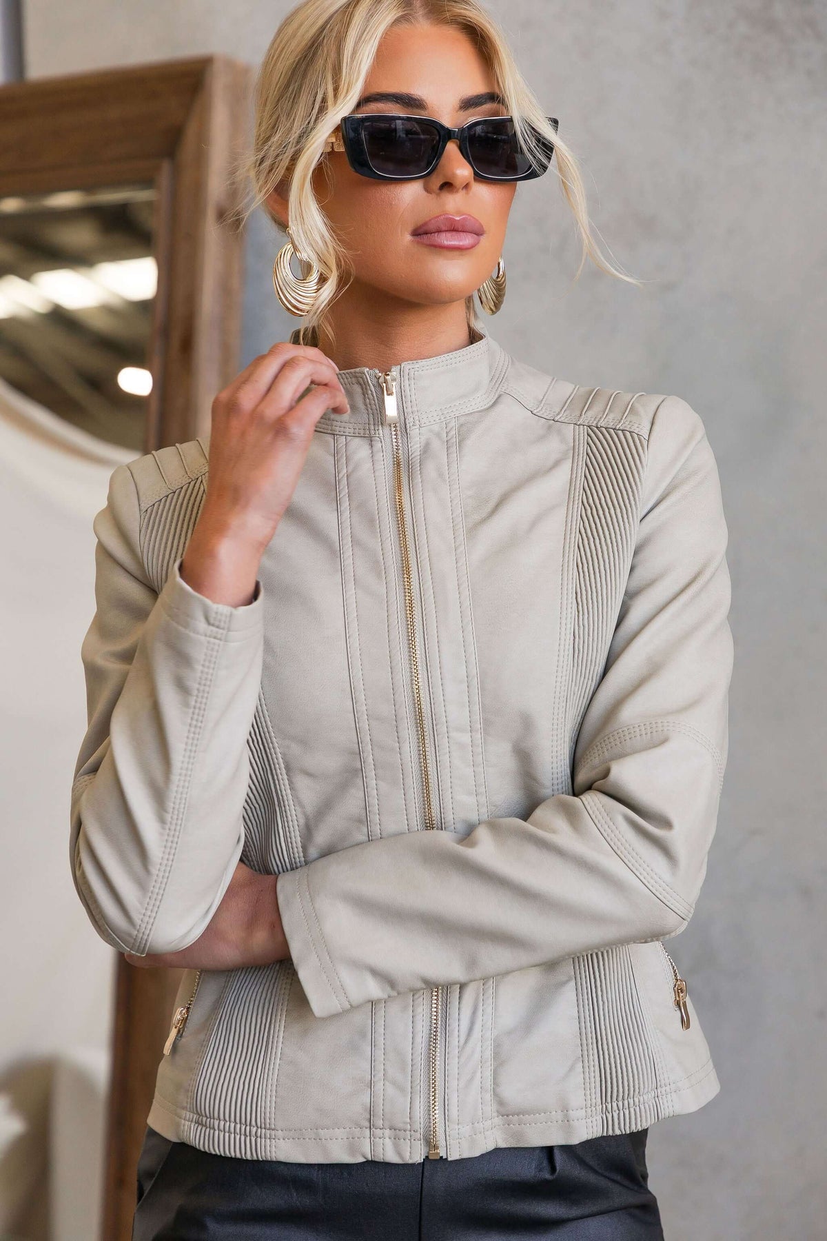Are You Ready Jacket featuring zip up front, faux leather, textured detail, and pockets for a chic look.