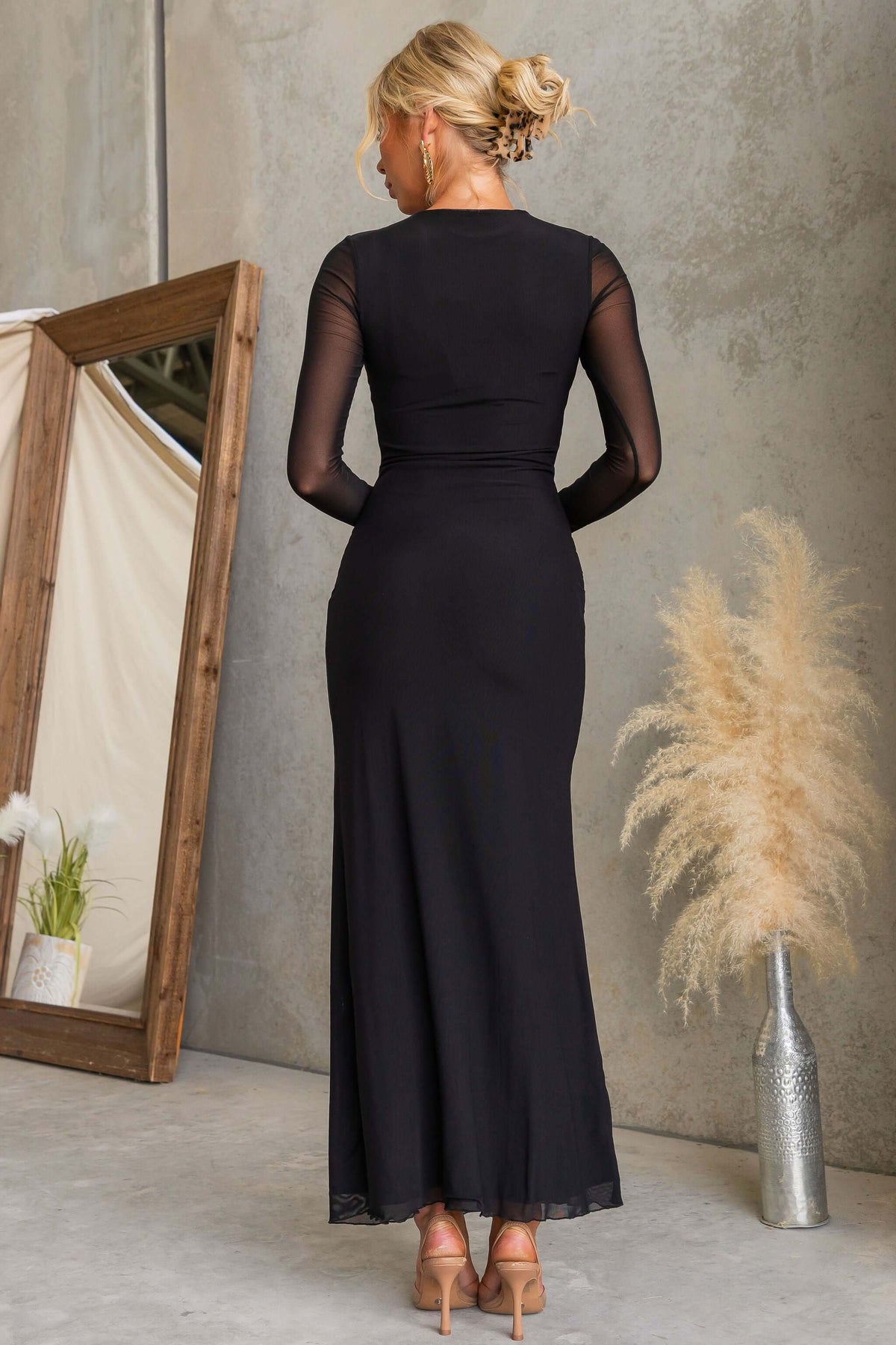 La Rose Maxi Dress featuring a detailed view of the back with sheer sleeves and elegant design.