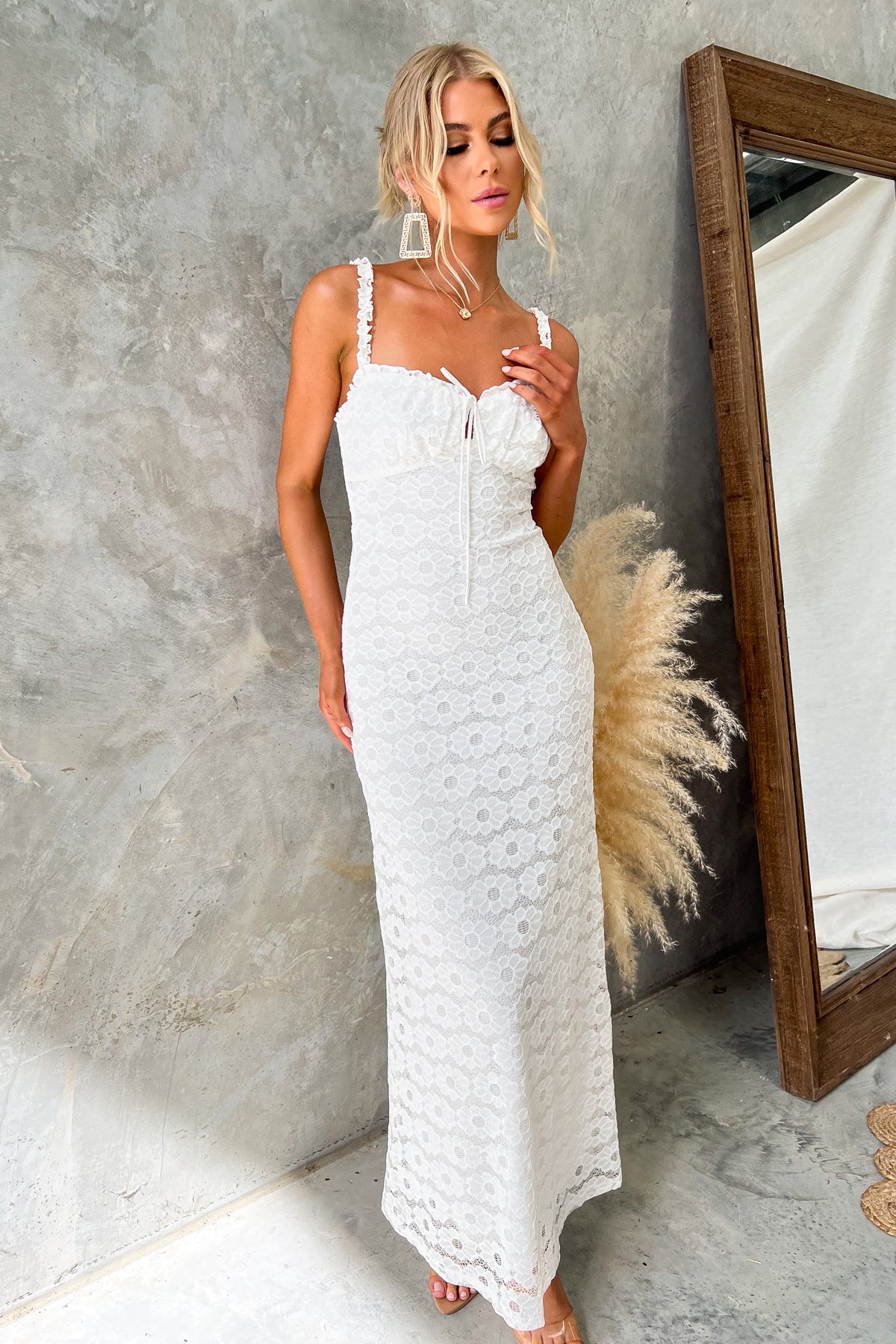Calma Maxi Dress by Amaroso Bridal in lace, featuring elastic straps and a back zip, perfect for elegant occasions.