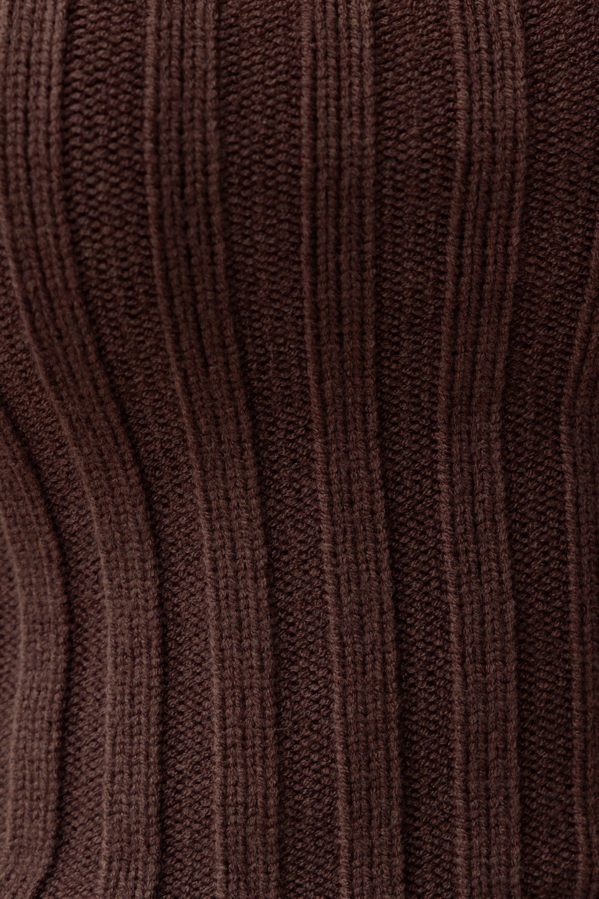 Close-up of textured brown ribbed knit fabric, showcasing stretch and detail suitable for Aspen Top.