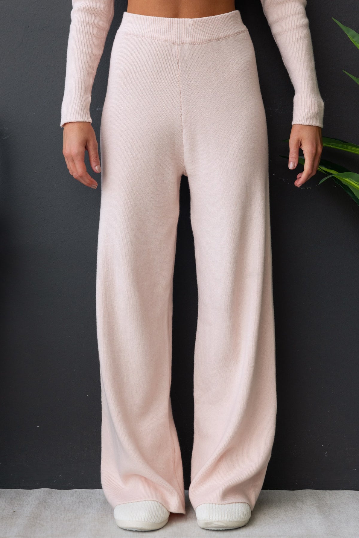 Darana Pants - mid-high waist, elastic waistband, soft knit material, light pink color, stylish and comfortable fit.