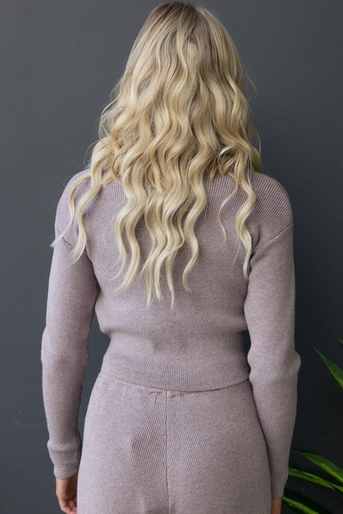 Back view of Darana Top featuring a ribbed knit design and round neckline, perfect for a stylish casual look.