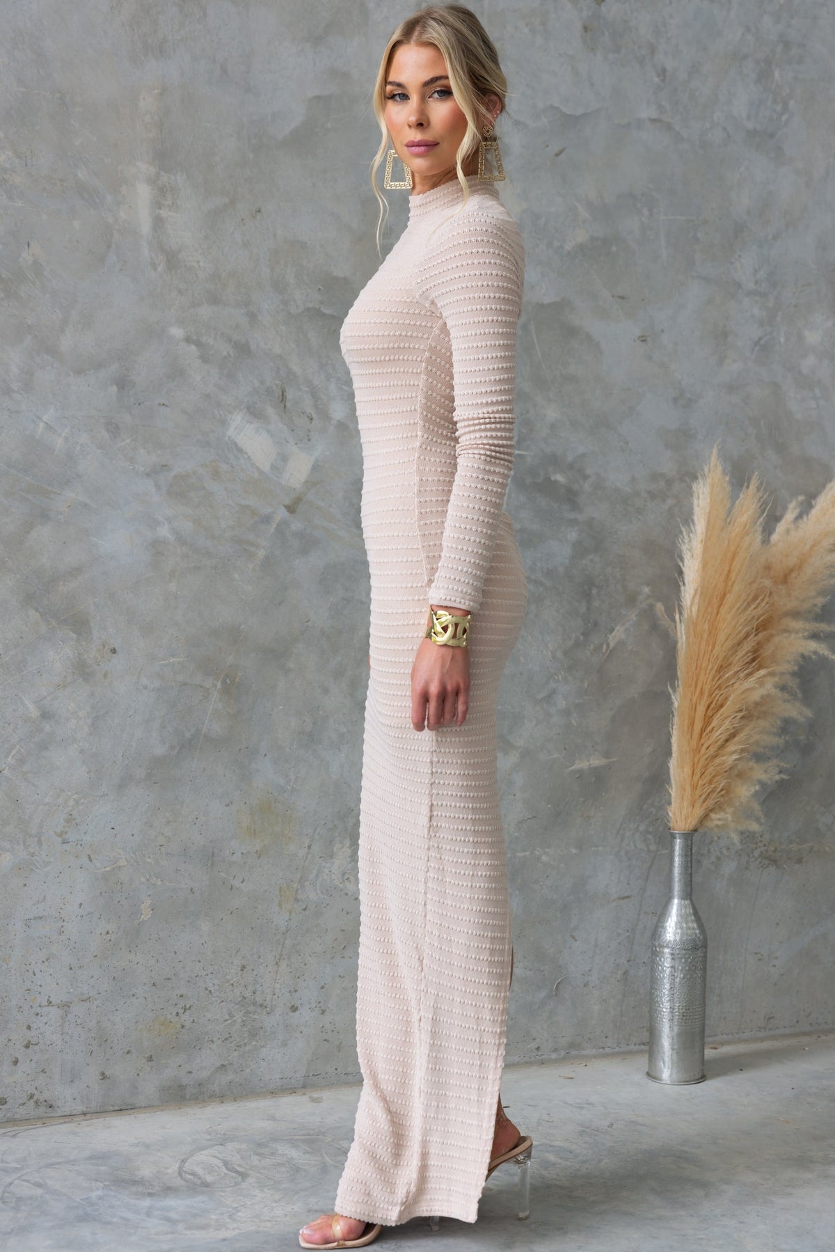 Everlie Maxi Dress in beige with high neckline and textured material, featuring a side split and elegant style.