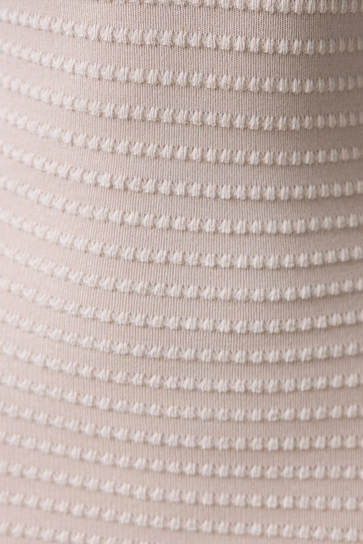Textured fabric detail of the Everlie Maxi Dress featuring a subtle striped pattern.