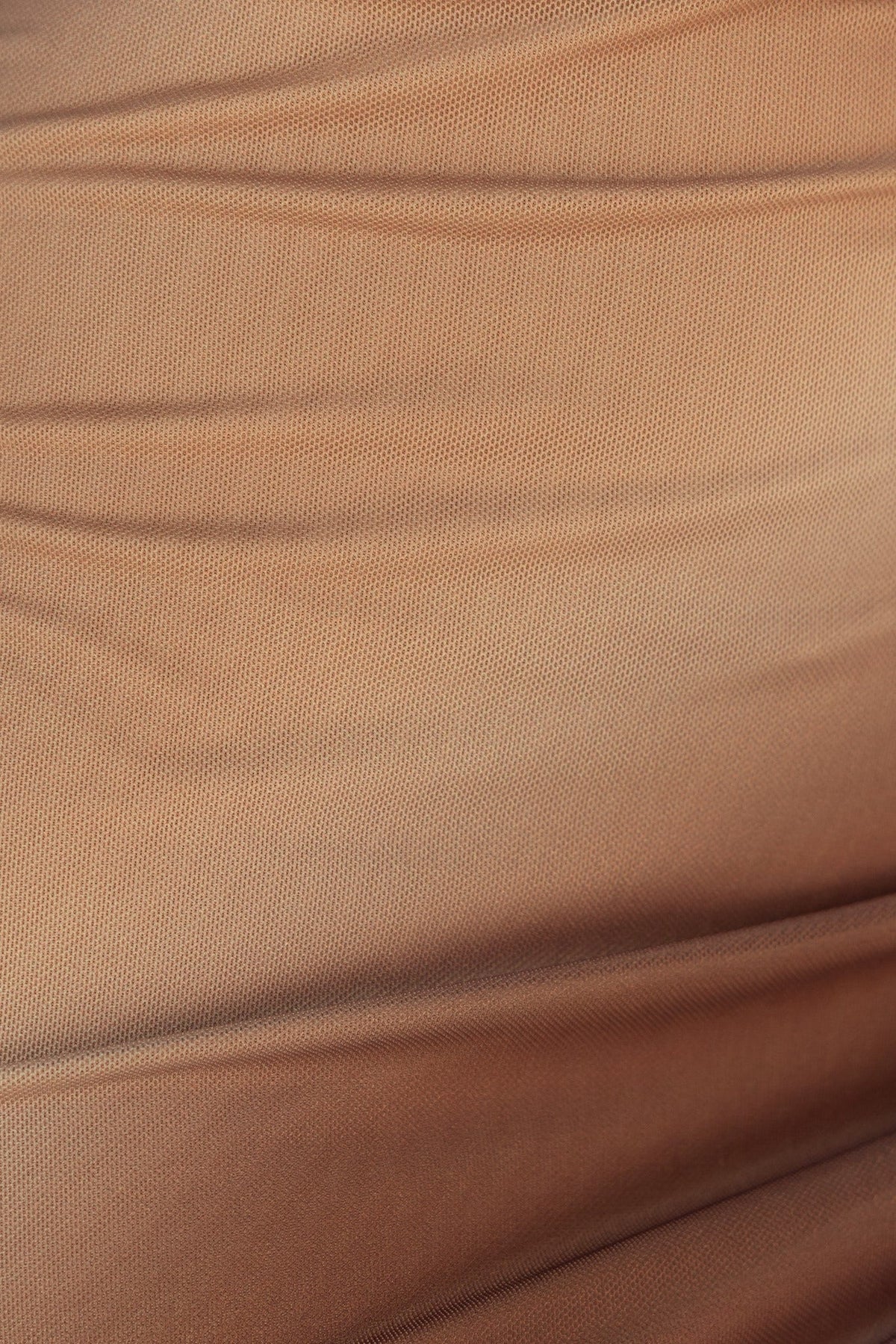 Close-up of the lightweight mesh fabric in a warm beige hue, showcasing subtle texture and stretch for comfort.
