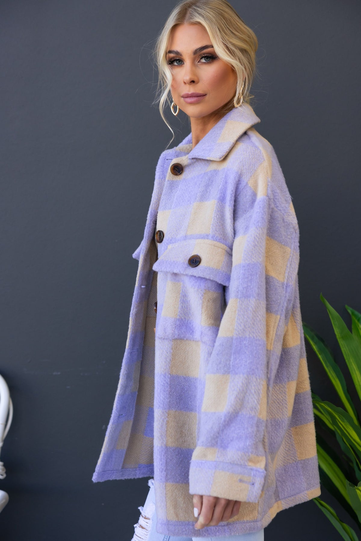 Home Run Shacket in lavender and beige checkered pattern, featuring button-up front and bust pockets, styled with relaxed fit.