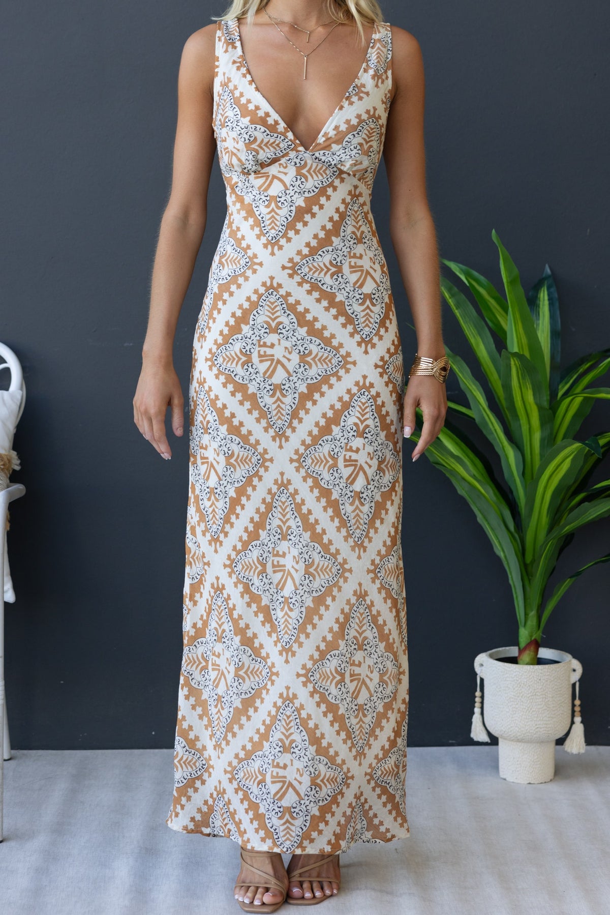Mirabella Maxi Dress featuring V-neckline and chic print, perfect for summer outings and events.
