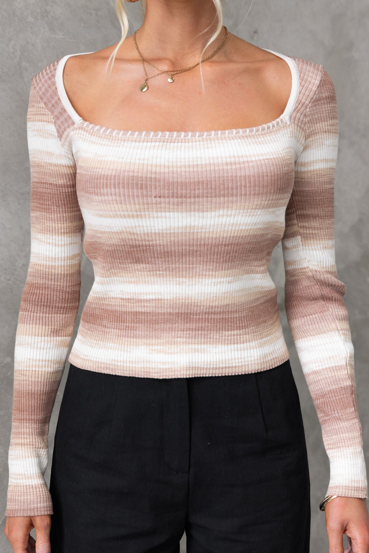 Yitra Top with square neckline in ribbed knit material, featuring soft striped pattern in pink and white.