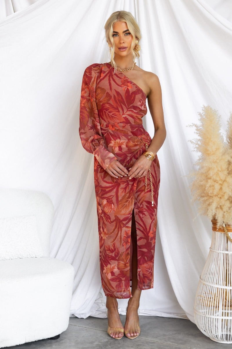 Floral print Wonders Midi Dress featuring one-shoulder neckline and asymmetrical hemline, styled with a gold chain detail.