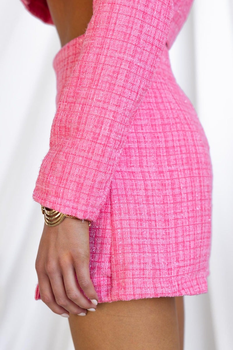 Sophia Shorts in pink tweed fabric with side zip, showcasing a stylish summer look.