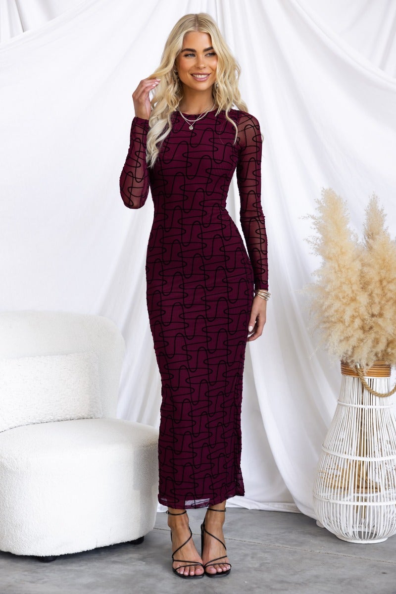 Corinda Maxi Dress featuring a mesh overlay, round neckline, and embossed print in maroon color. Perfect for stylish occasions.