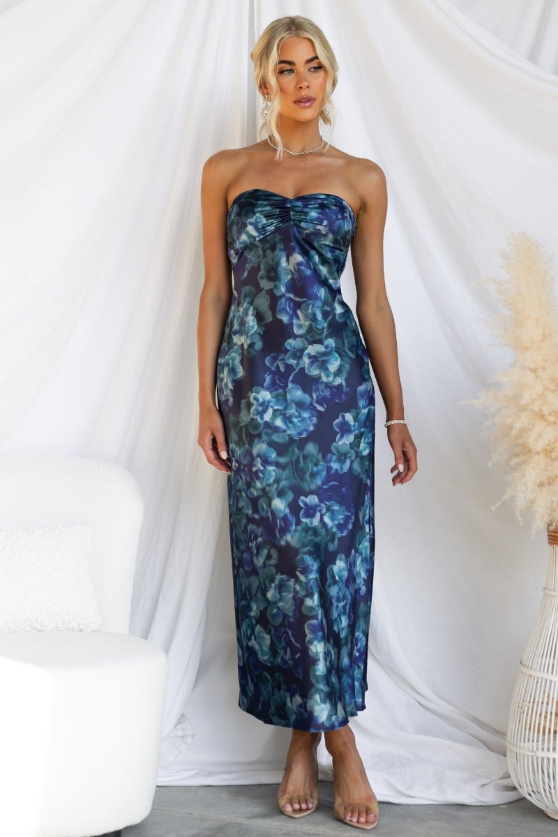 Navy floral print strapless Yuna Maxi Dress, elegant summer wear showcased on a model.