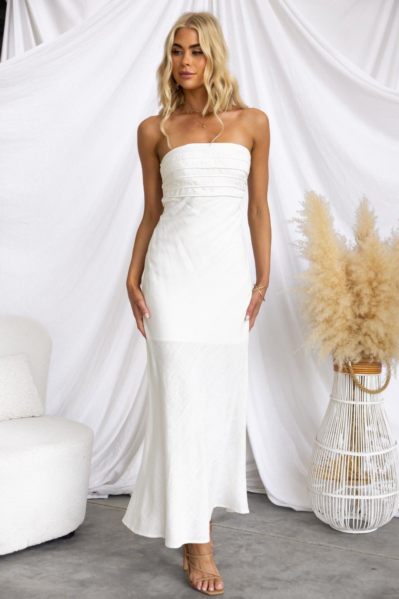 Wilder Maxi Dress in white, strapless linen blend with anti-slip bust, fitted with an elastic back and side zip.