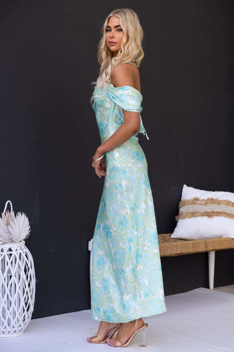 Model wearing the Jiah Multi-colour Maxi Dress featuring adjustable tie straps and cap sleeves.