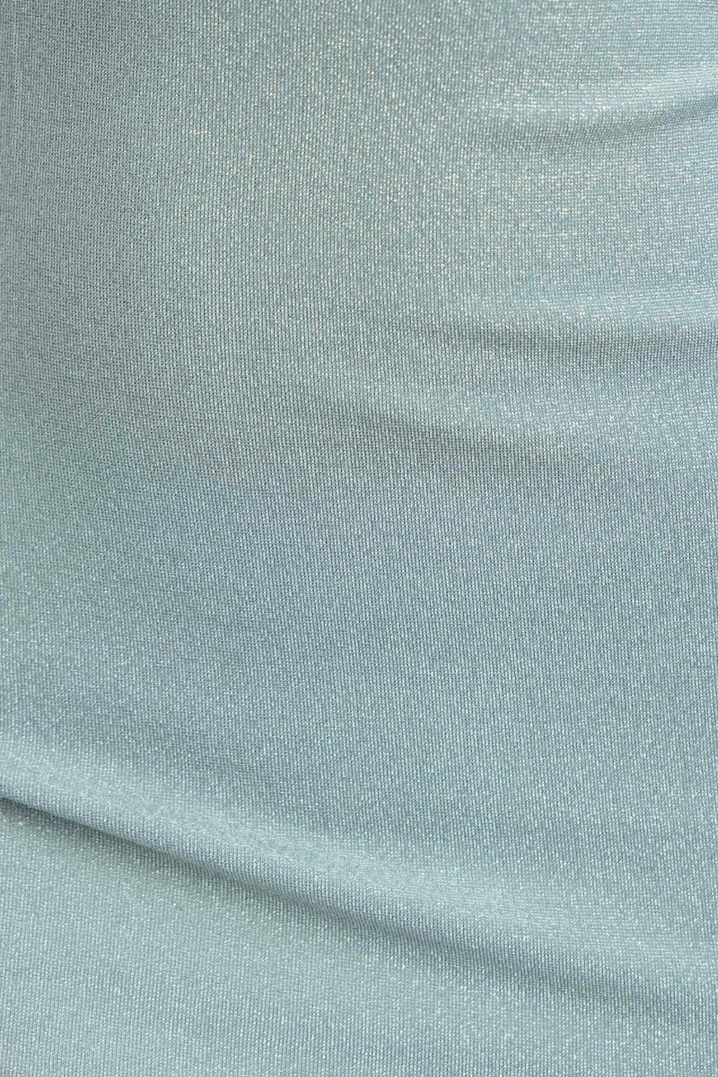 Glittery light blue fabric texture showcasing sparkle and stretch, perfect for a stylish dress design.