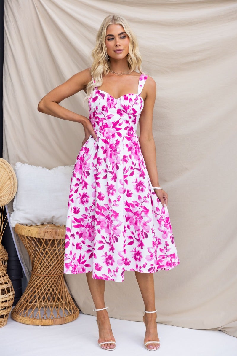 Floral print midi dress with adjustable straps and padded bust, featuring a front split and invisible back zip.