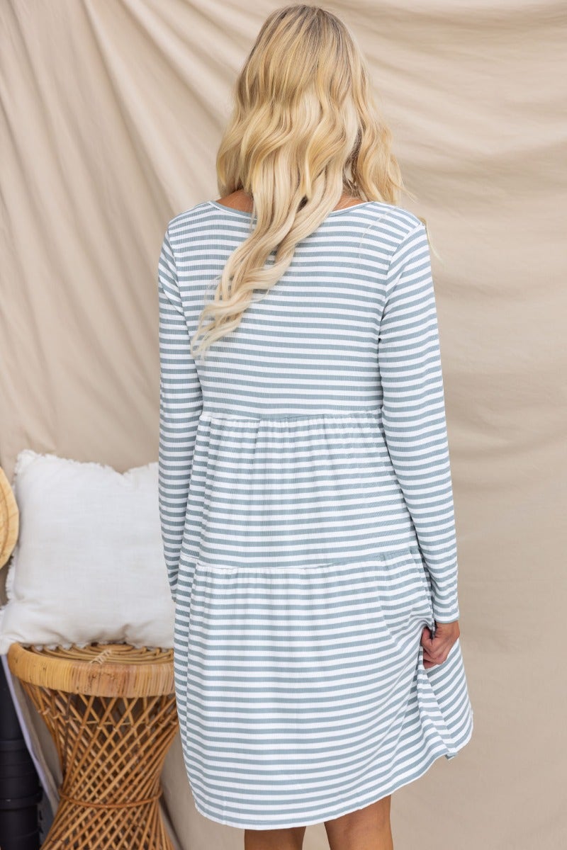 Ribbed Sorrell Dress in blue and white stripes, featuring a relaxed fit and V-neckline, showcasing the back view.