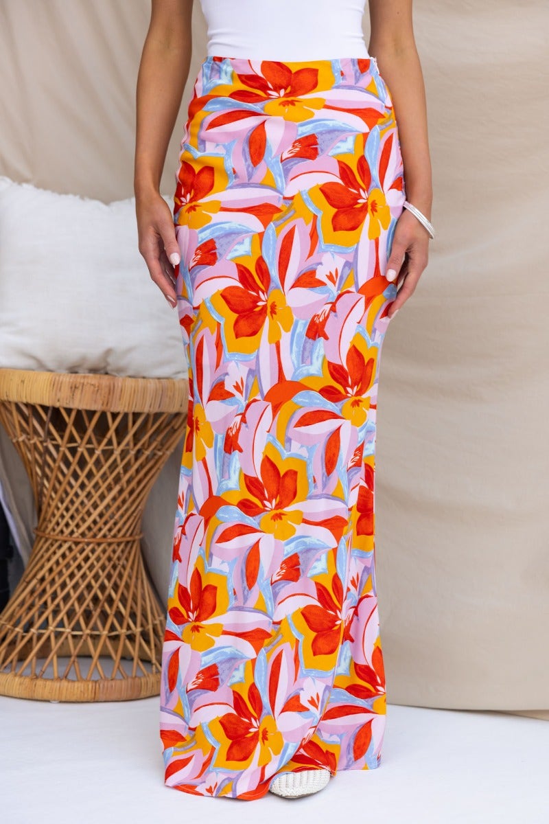 Heartful maxi skirt with vibrant floral print, perfect for summer styling, featuring a side invisible zip and standard fit.